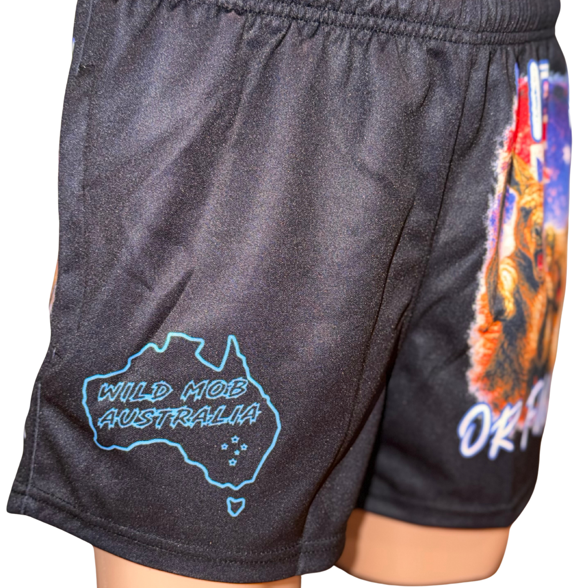 Fit in or Fuck off footy shorts with a kangaroo, koala and emu on the Aussie flag. Quick-dry, zip pockets, adult sizes XS–5XL.